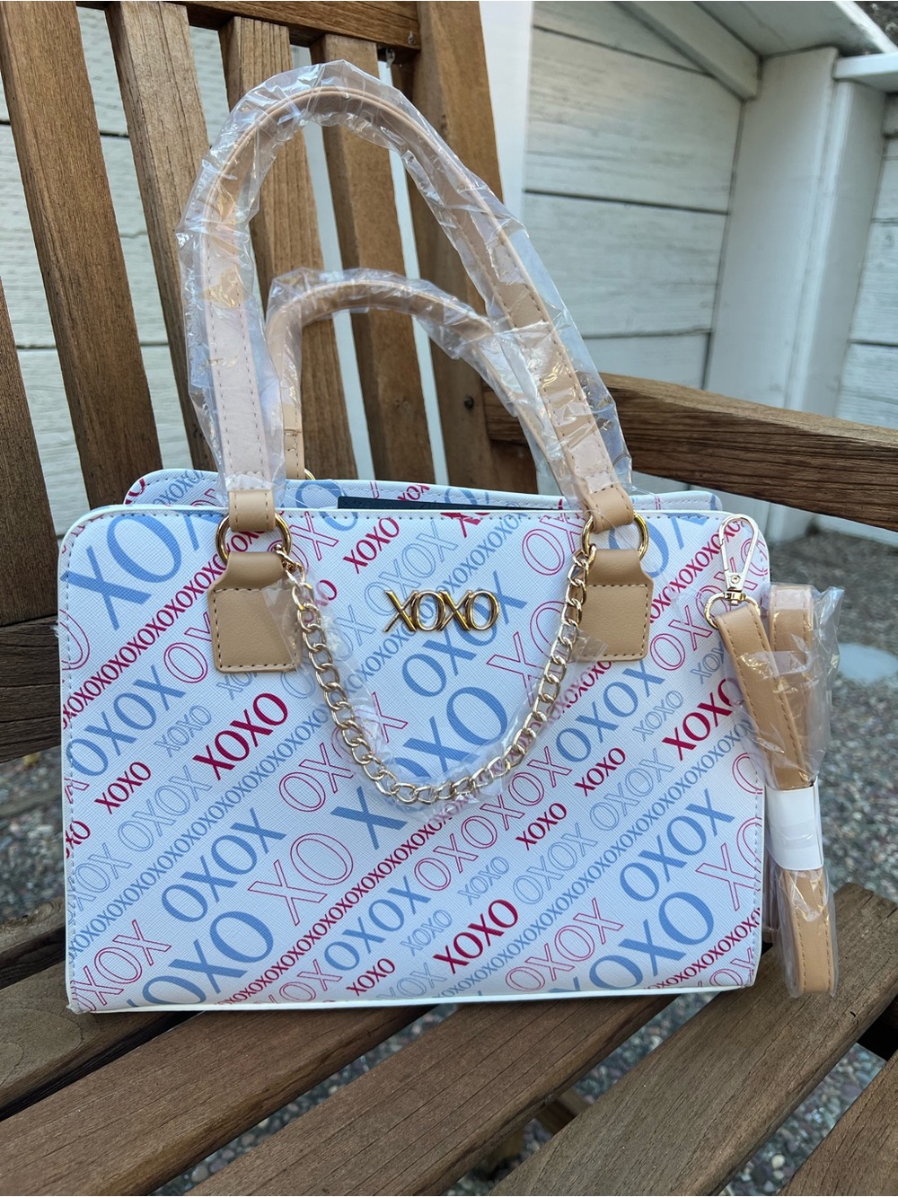XOXO White Satchel with Blue and Red Logo Print and Tan Trims